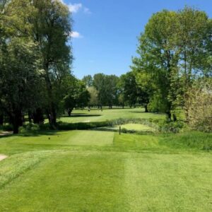 A wide view of the fairway in the sunshine