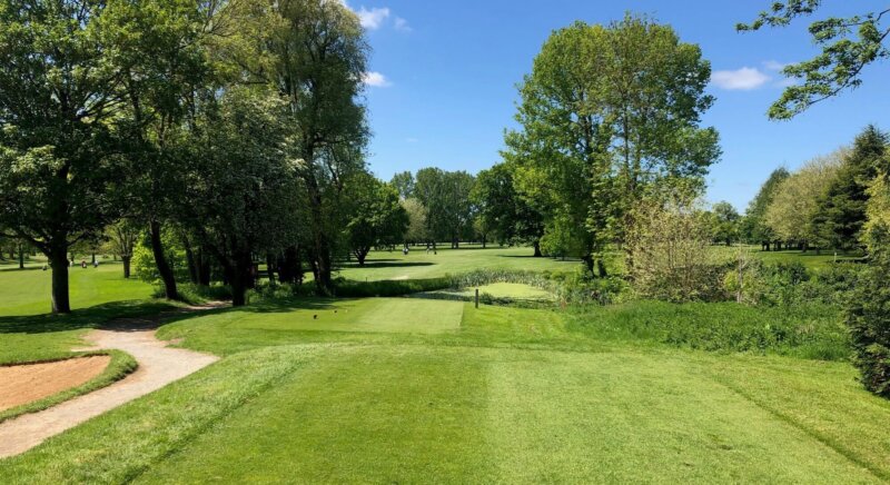 A wide view of the fairway in the sunshine