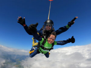 Farleigh employee karen freefalls during a tandem skydive